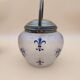 Crystal biscuit jar decorated with blue enamel and gilding.