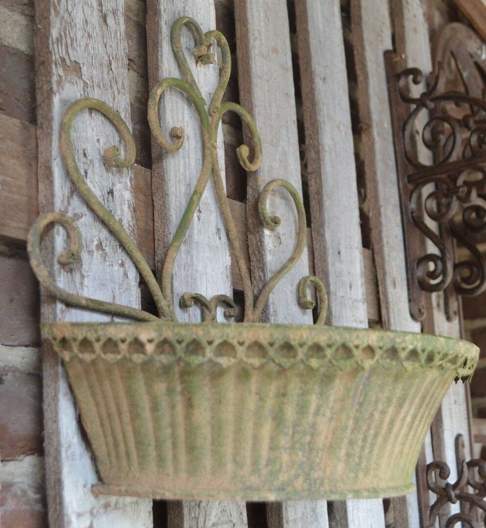 Patinated iron wall planter