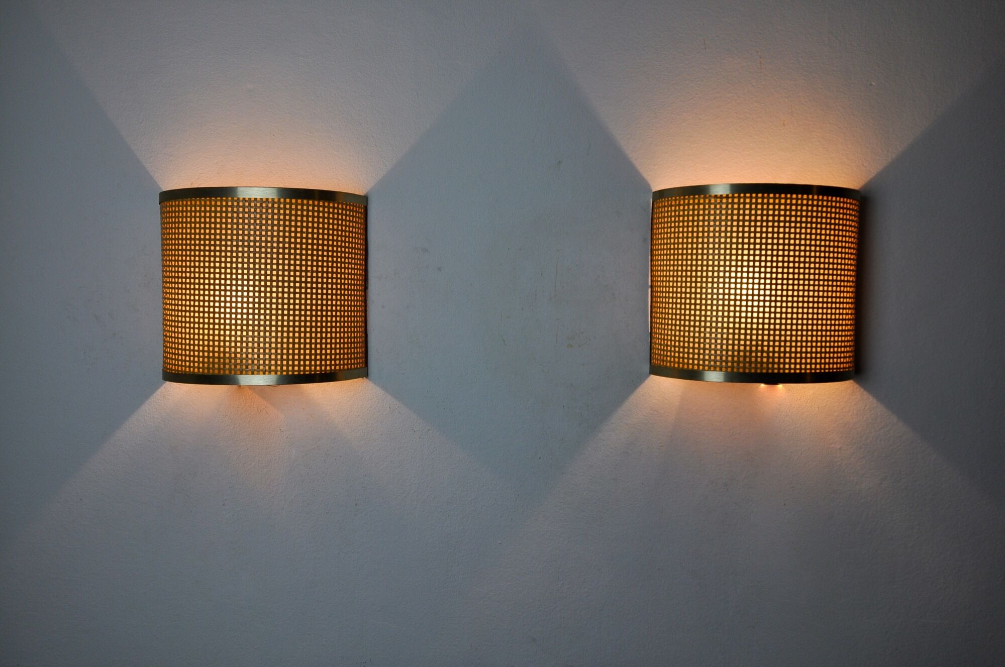 Pair of rattan and brass appliques, Italy, 1960