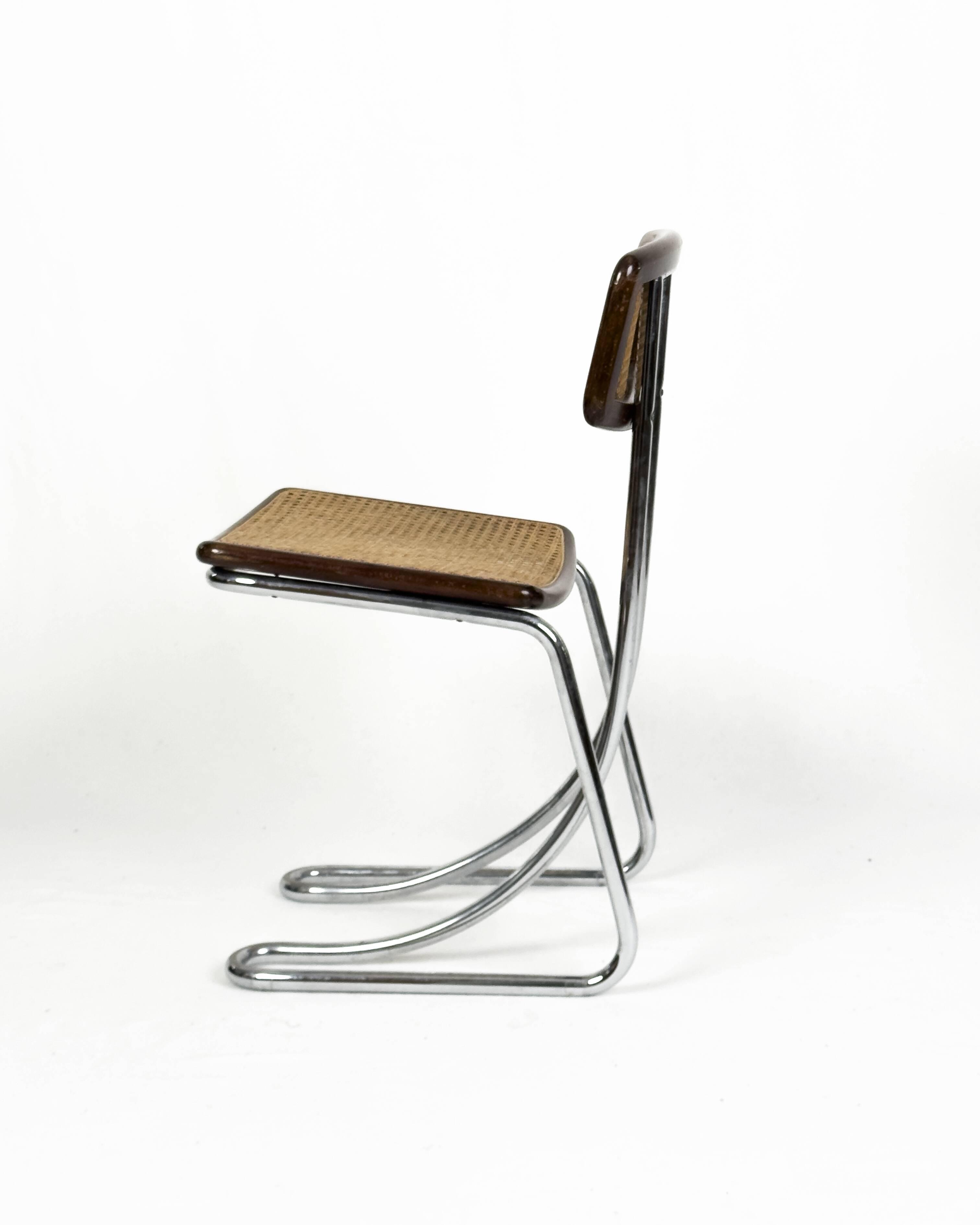 Ensemble de 4 chaises vintage à accoudoirs en chrome, bois et paille de Vienne, années 1970.