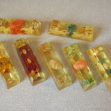 Set of 7 old knife rests 1970s resin inlays