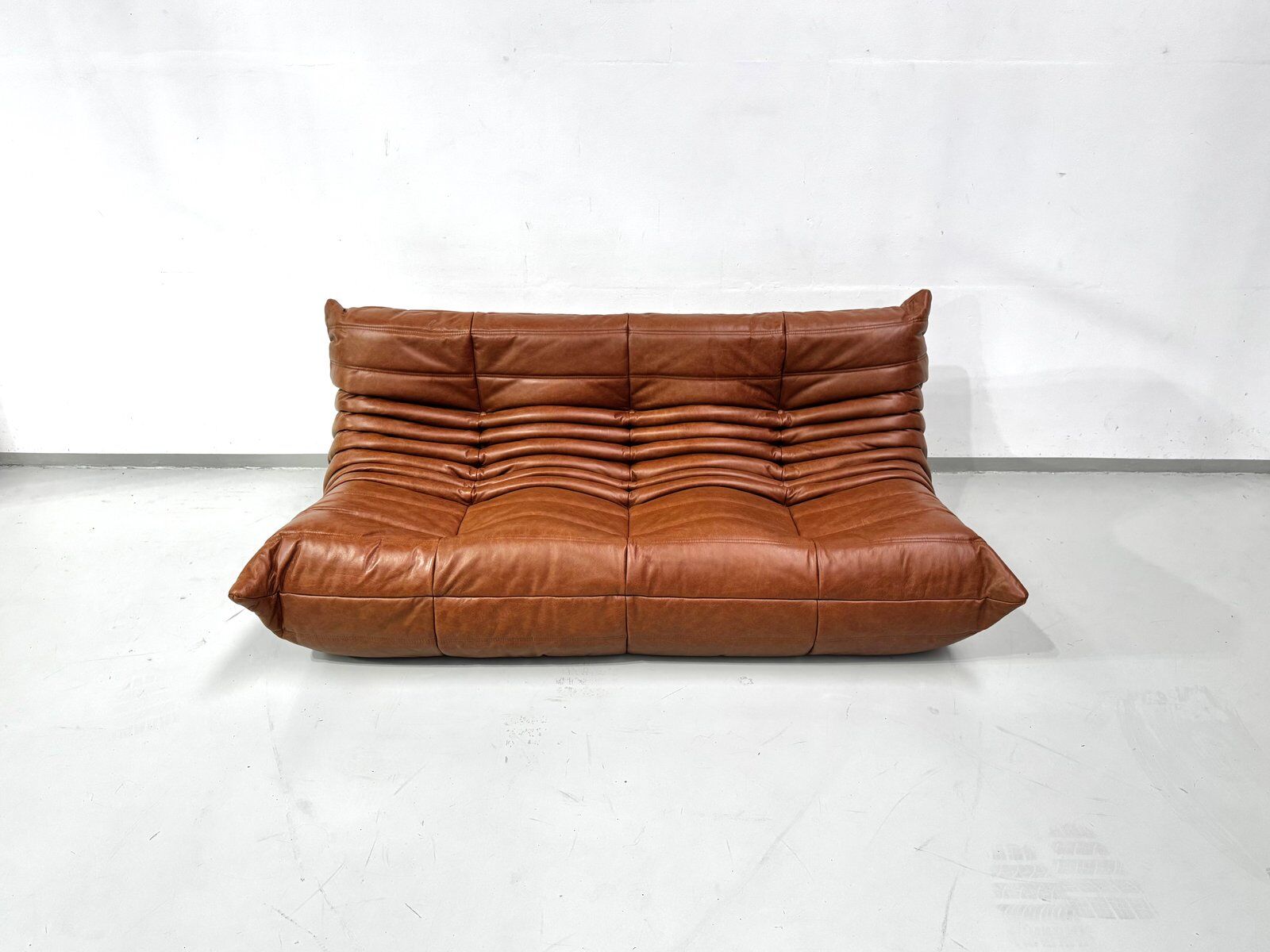 Togo sofa in cognac cowhide by Michel Ducaroy for Ligne Roset.