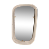 Luminous mirror in perforated sheet metal and brass