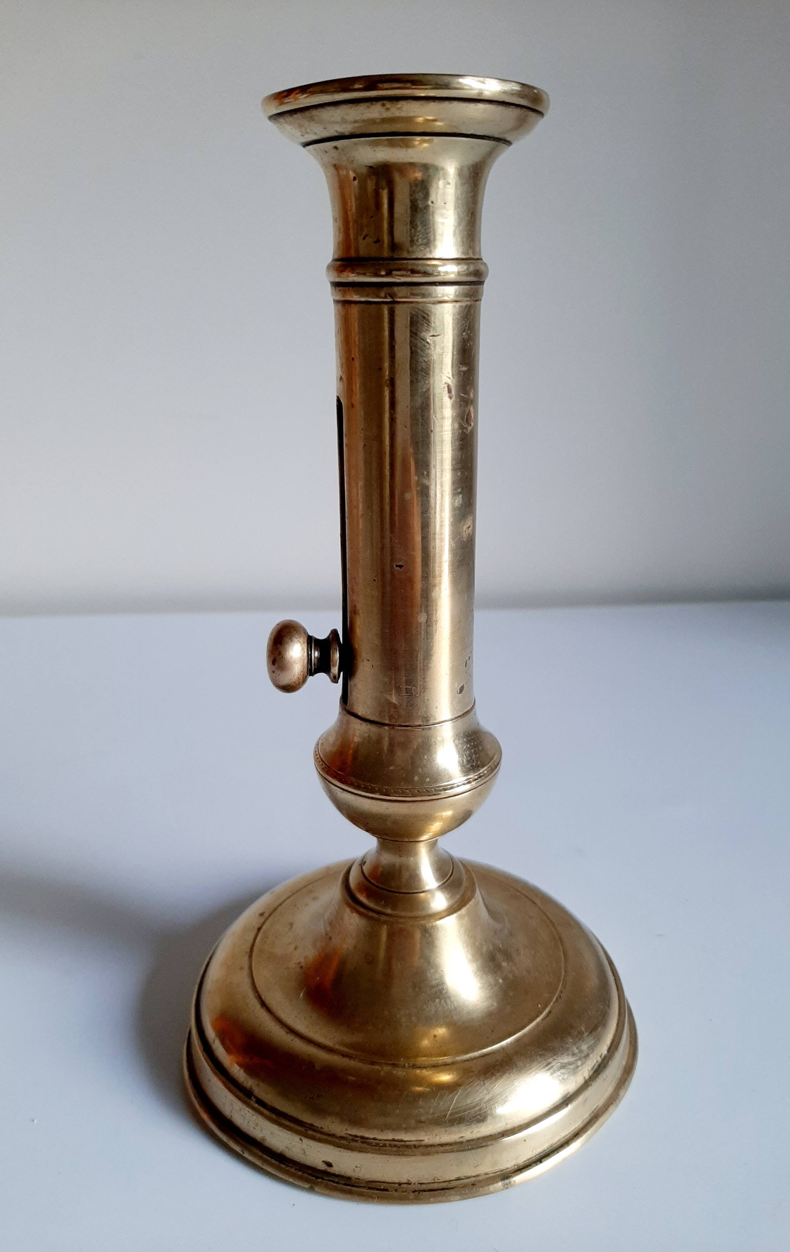 Golden brass candle holder