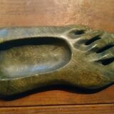 Ashtray in carved and polished stone.