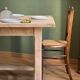 Farm table made of solid light oak wood.