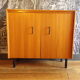 Vintage shoe cabinet with accordion doors