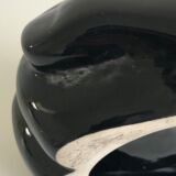 Empty black enamelled hand-shaped ceramic pocket, 1970