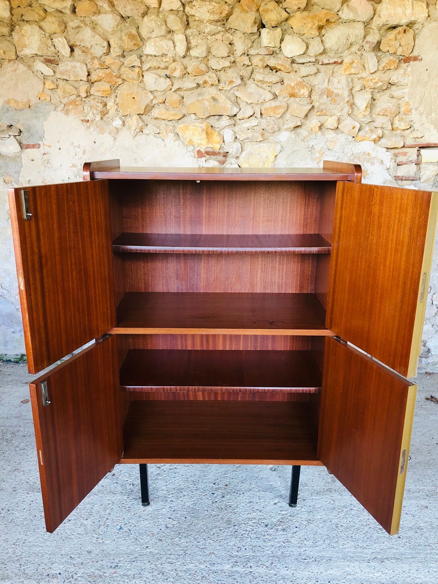 Storage cabinet with double compartment, metal feet circa 60's
