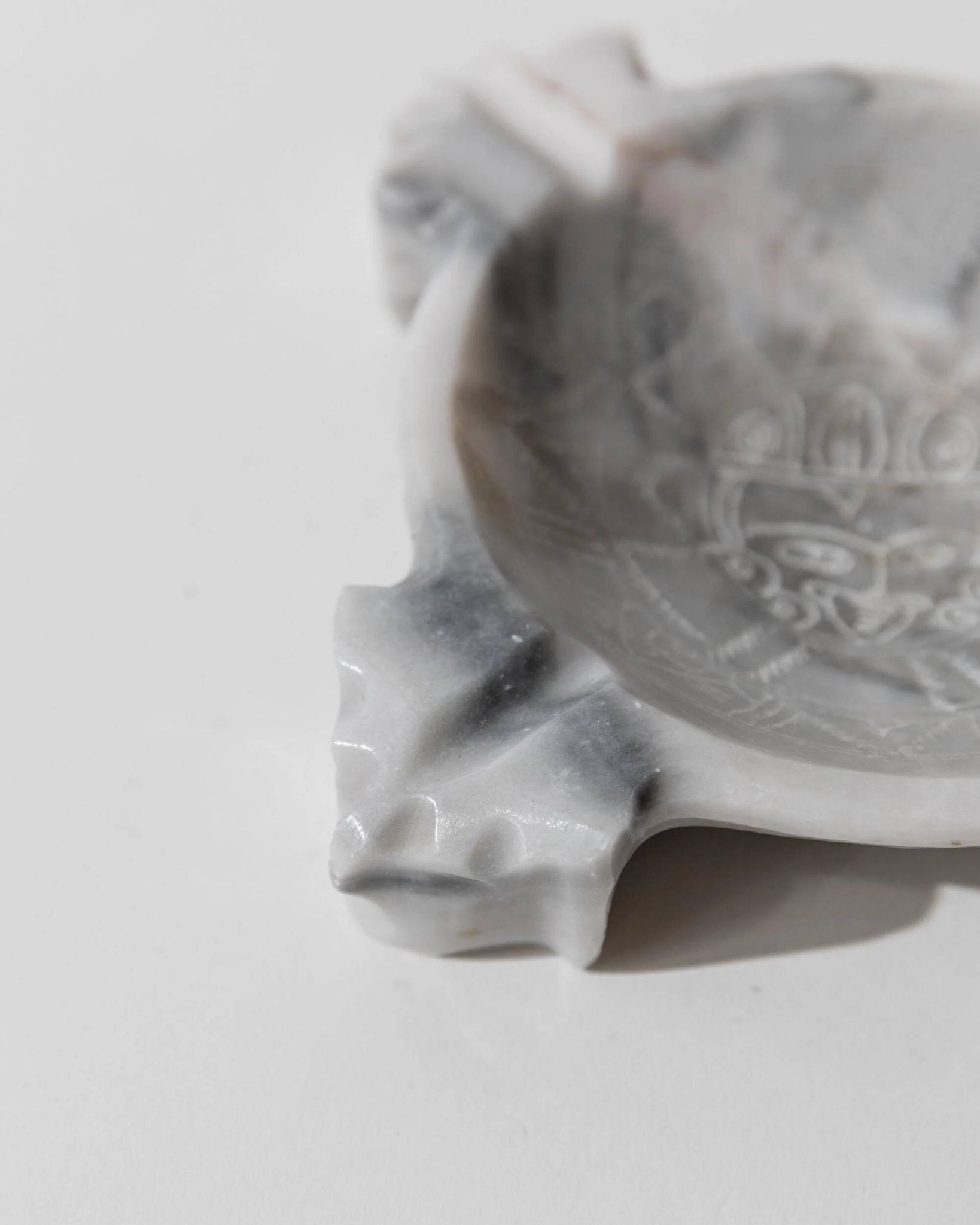 Vintage Mexican marble ashtray from the 1970s, engraved Aztec pattern.