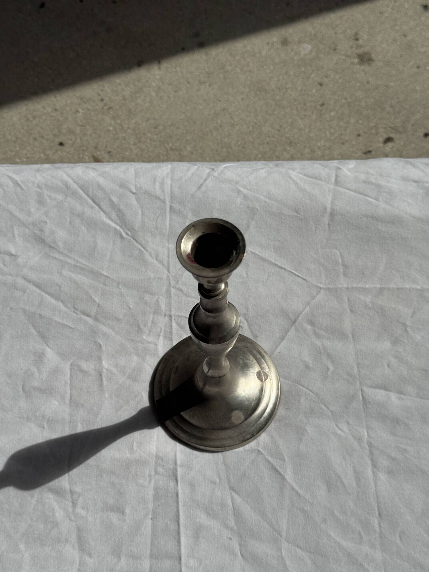 Antique silver-plated candlestick with baluster shaft H21 D9.5