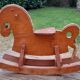 Rocking horse in raw and glazed wood