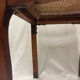 Caned armchair