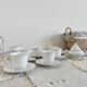 Vintage porcelain tea/coffee service with gold edging for 6 people, sugar bowl and milk jug