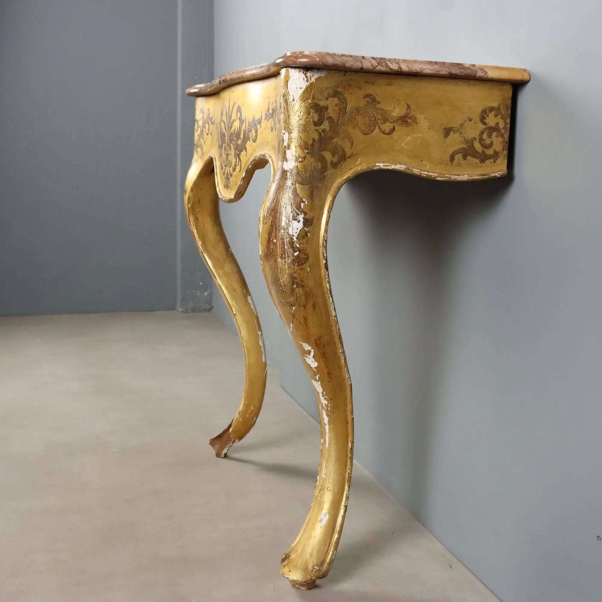 Antique gilded wooden console with marble top, Italy, 19th century.