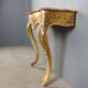 Antique gilded wooden console with marble top, Italy, 19th century.