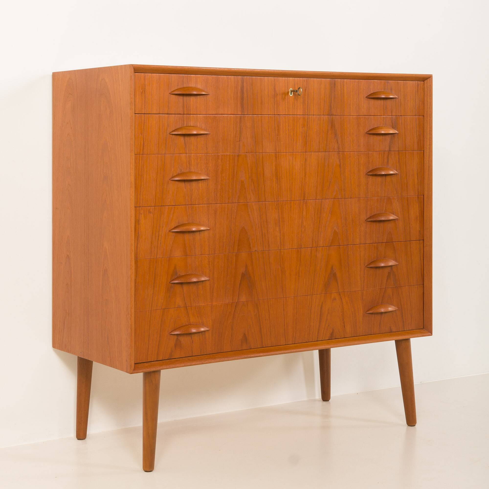Scandinavian teak chest of drawers by Johannes Sorth for Nexo Mobelfabrik.