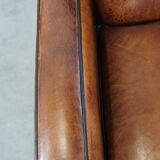 Set of 2 stylish yet comfortable armchairs made of sheepskin leather with a sleek design