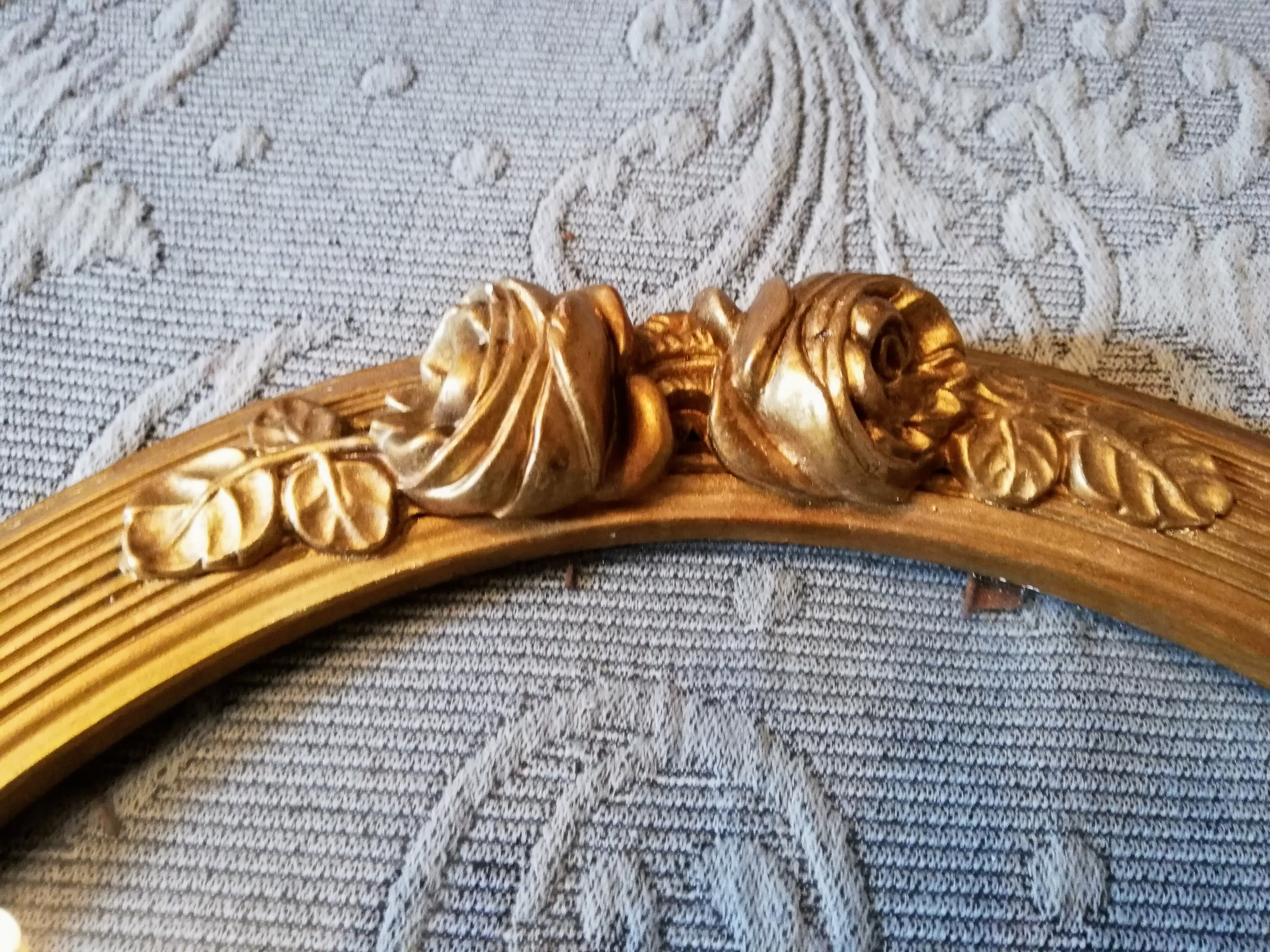 Oval gold frame art deco