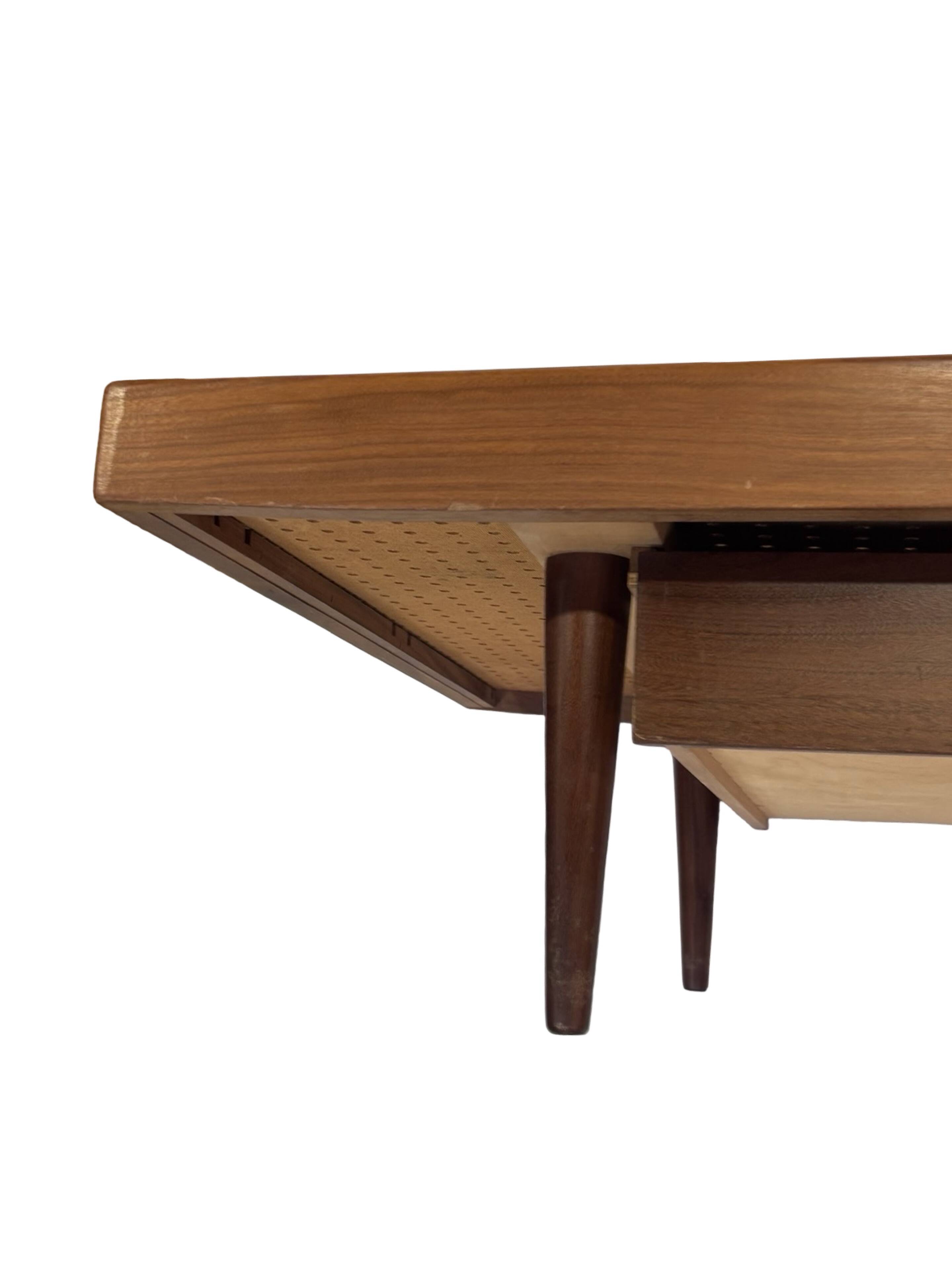 Vintage 1950s teak sofa bed with drawers.