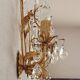 Hand-forged wall lamp gilded with gold leaf and crystals, Italy
