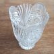 Small crystal vase with chiseled patterns and geometric decorations
