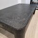 Industrial coffee table in riveted metal from around 1920 – black patina – 145 × 80 cm