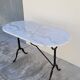 Cast iron bistro table and old oval marble top