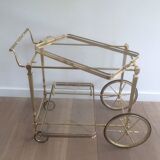 Brass rolling table from the Baguès house.