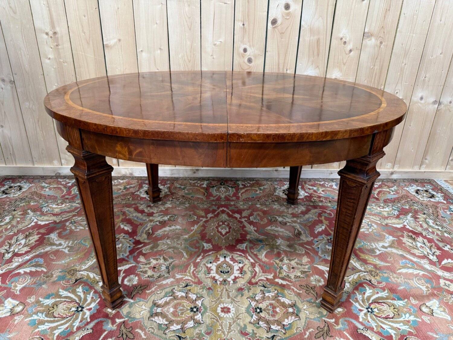 Extendable oval table in Louis XVI style – Walnut and Burl Marquetry