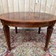 Extendable oval table in Louis XVI style – Walnut and Burl Marquetry