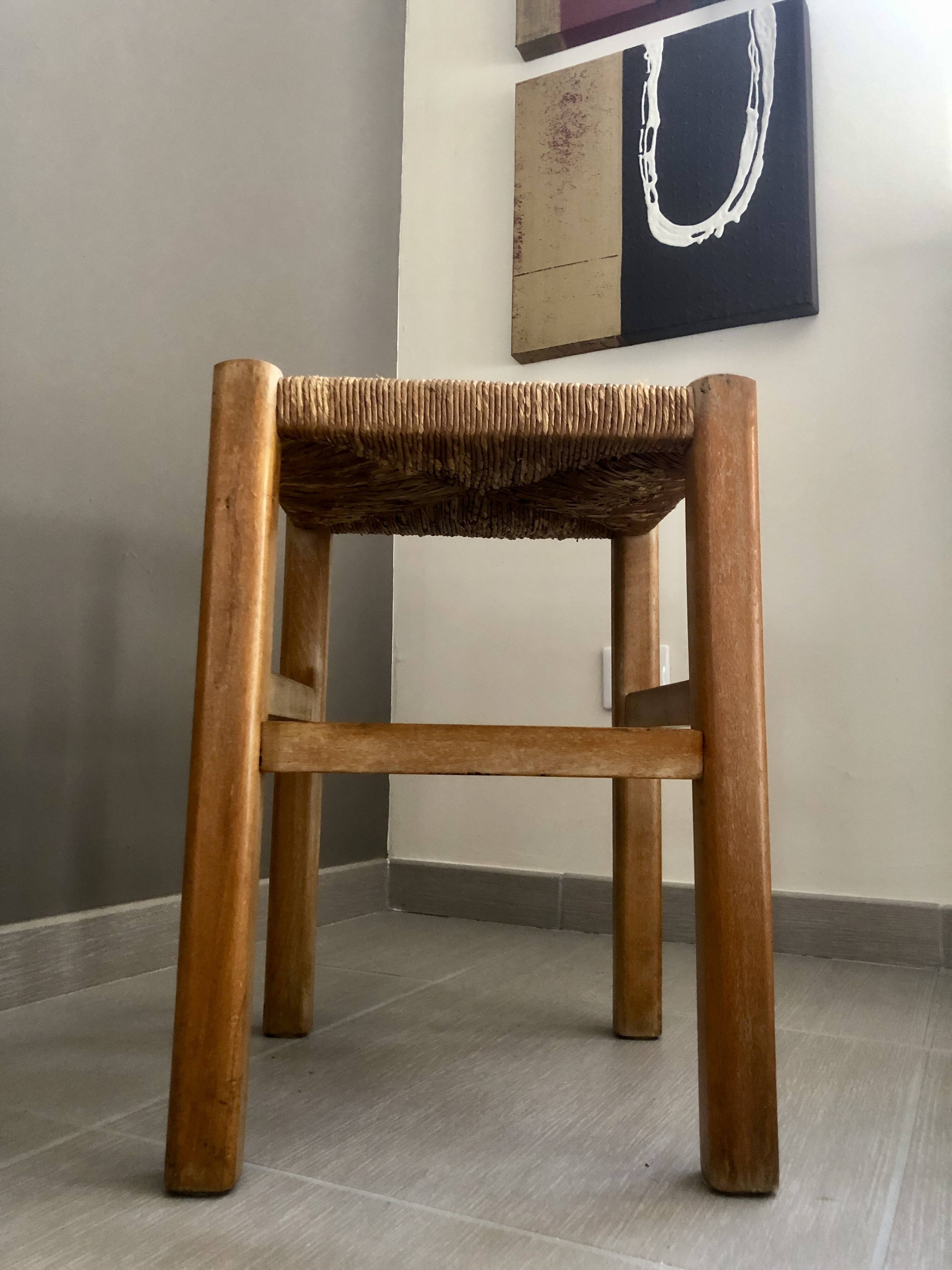 Wooden stool with straw seat