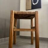 Wooden stool with straw seat