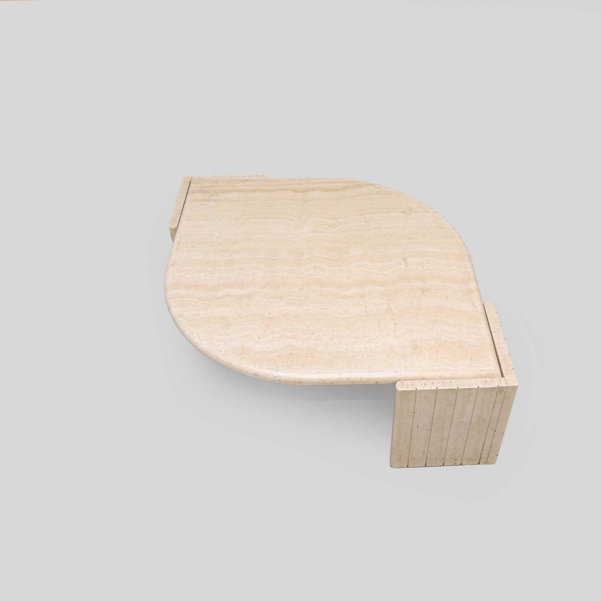 Vintage 'teardrop' travertine coffee table, Italy, 1970s.