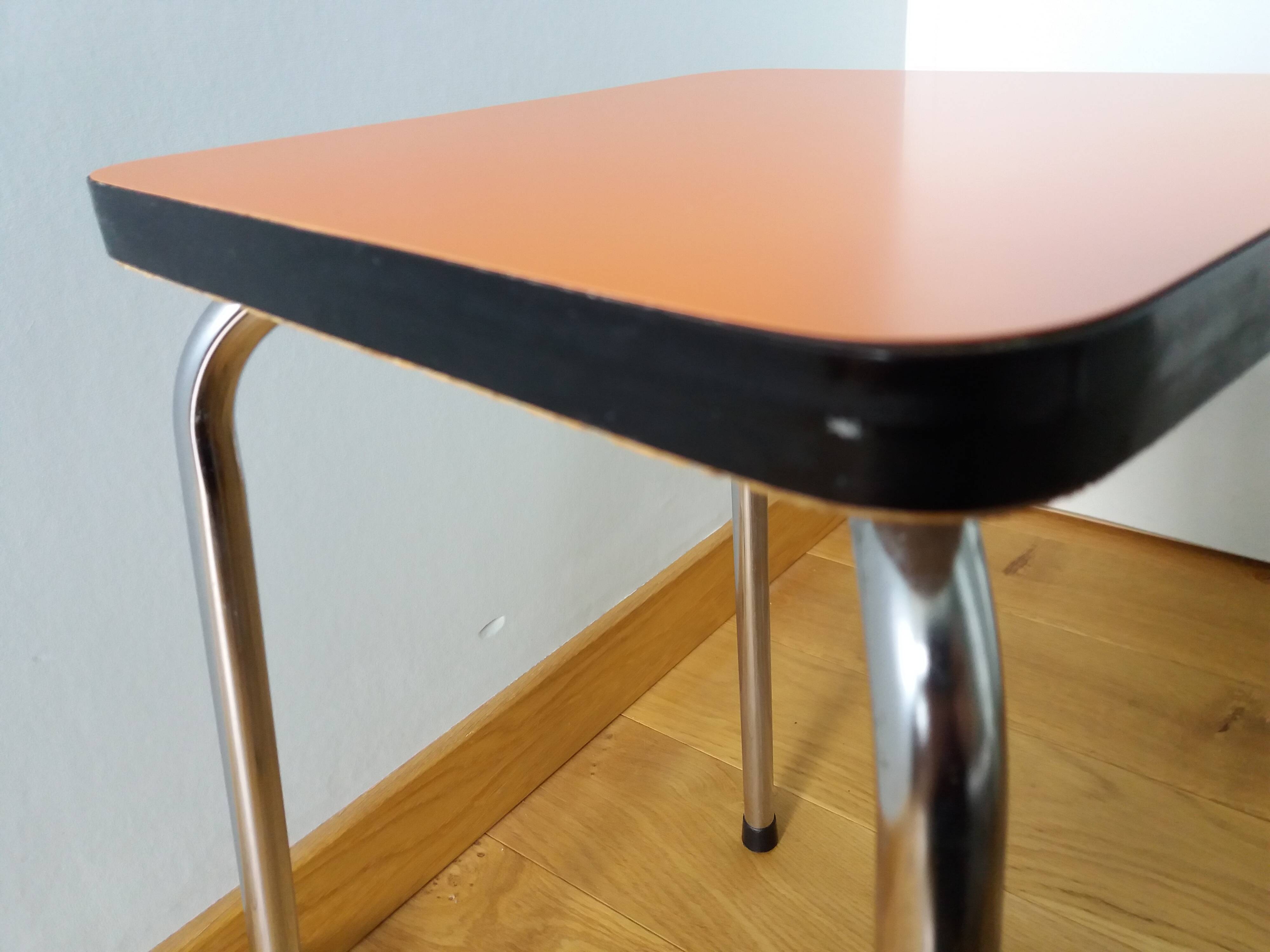 Chrome metal and orange formica stool