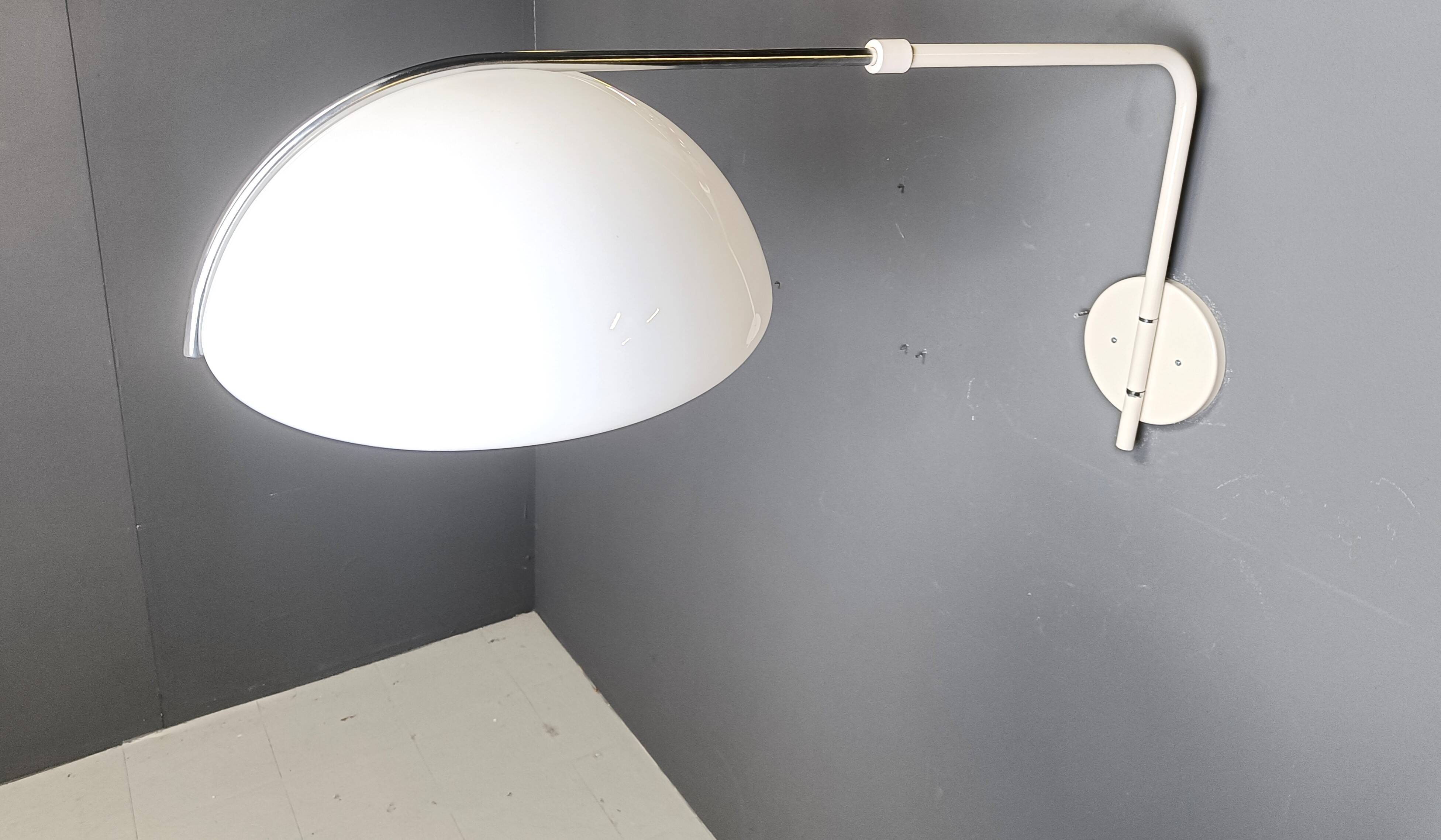 Vintage wall lamp by Luigi Massoni for Guzzini, 1970s