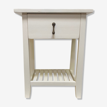 Wooden bedside table painted white