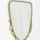 Elegant wall mirror in brass and black from the mid-century, Italy, 1950s.