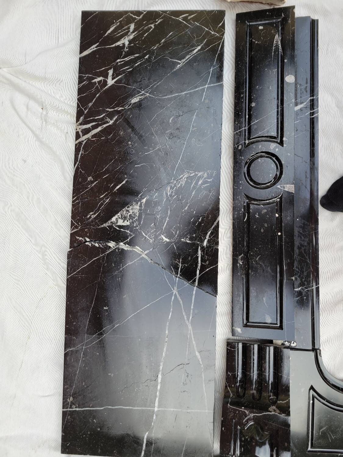 Pompadour fireplace with black marble modillions