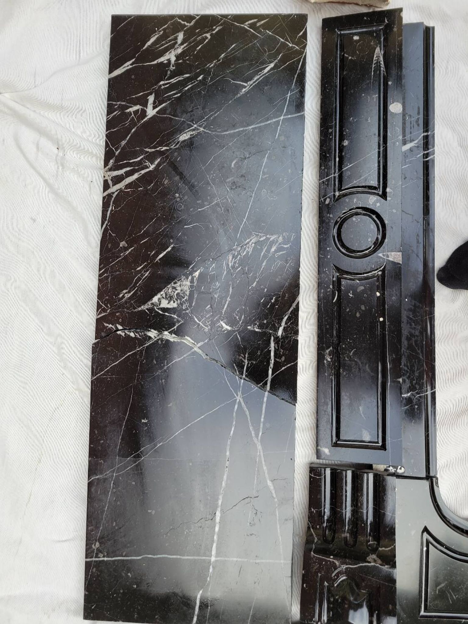 Pompadour fireplace with black marble modillions
