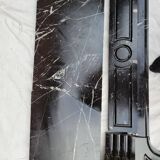 Pompadour fireplace with black marble modillions