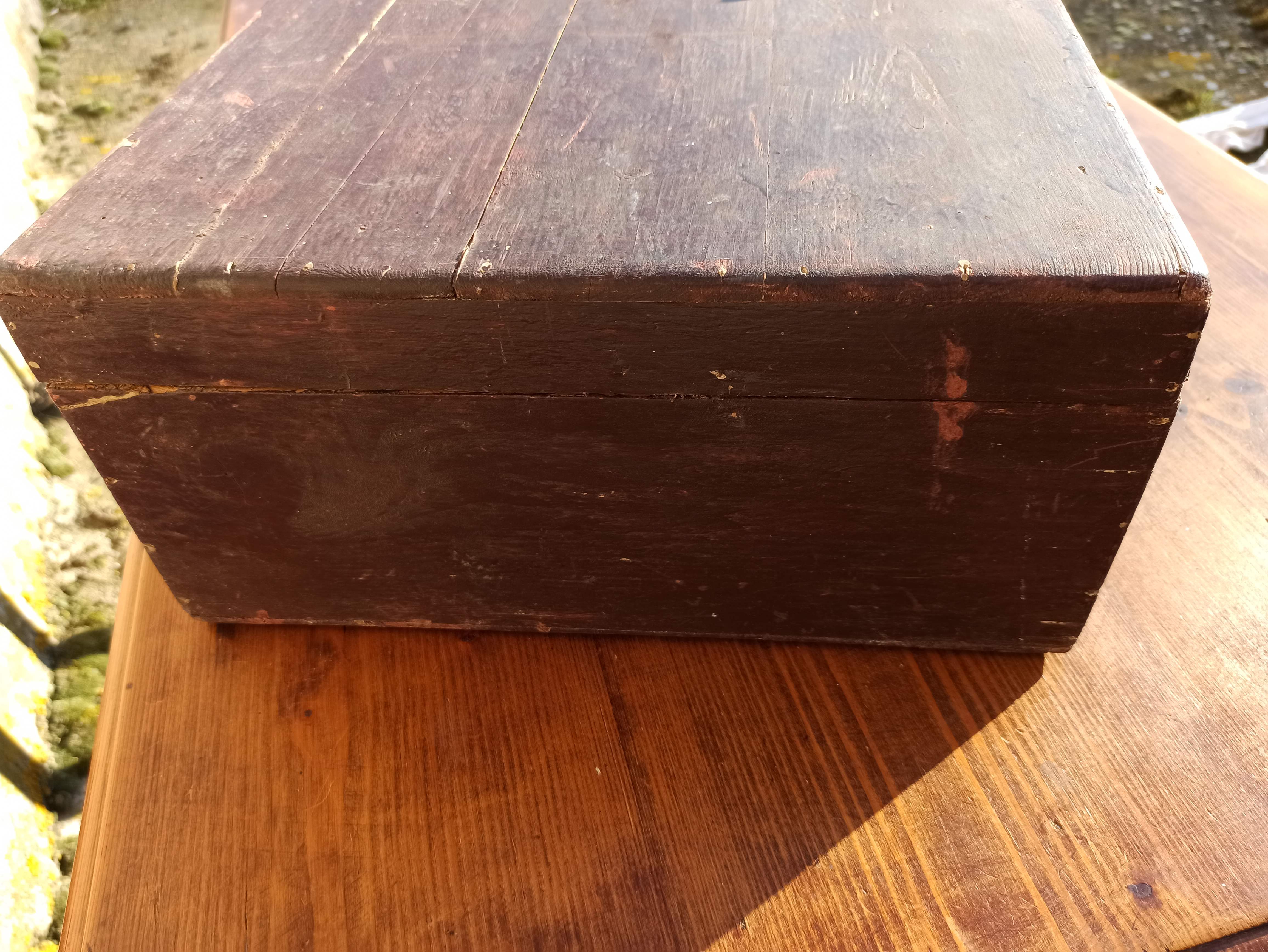 Antique wooden suitcase with lock and key