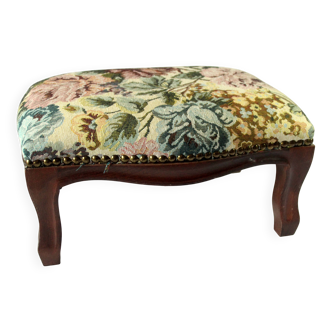 Small foot stool made of wood with upholstery, vintage from the 70s