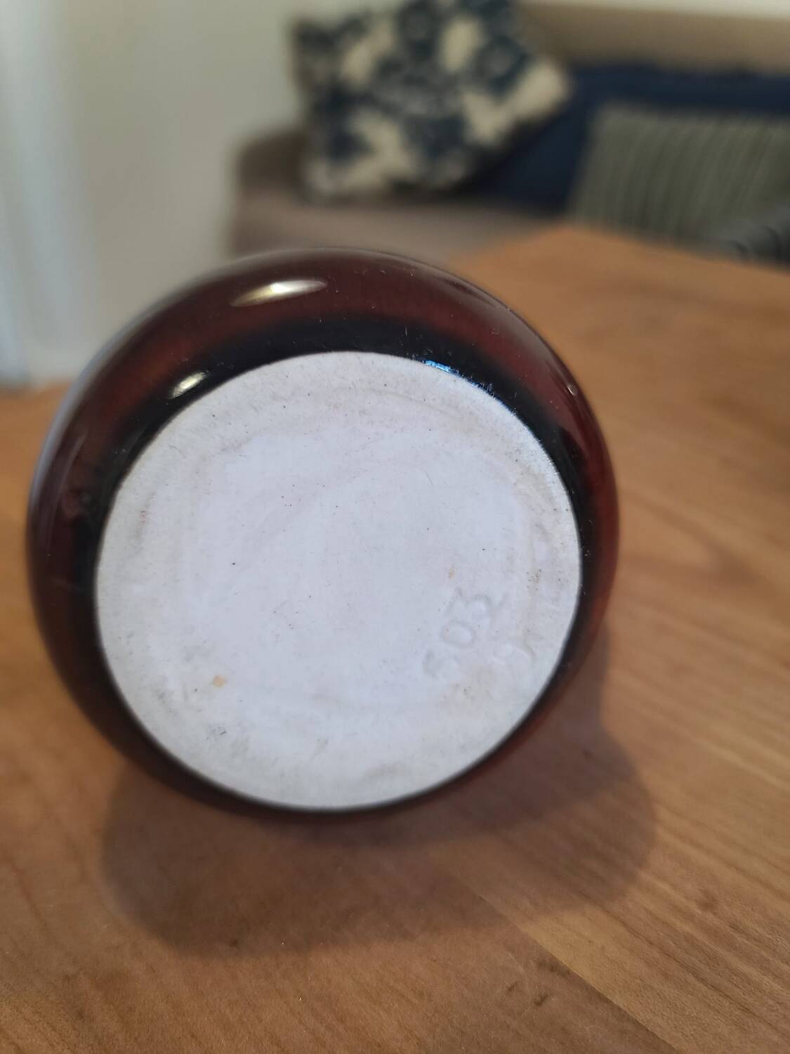 Brown ceramic milk jug