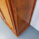 Vintage woven rattan and wood armoire by Maugrion for Roche-Bobois.