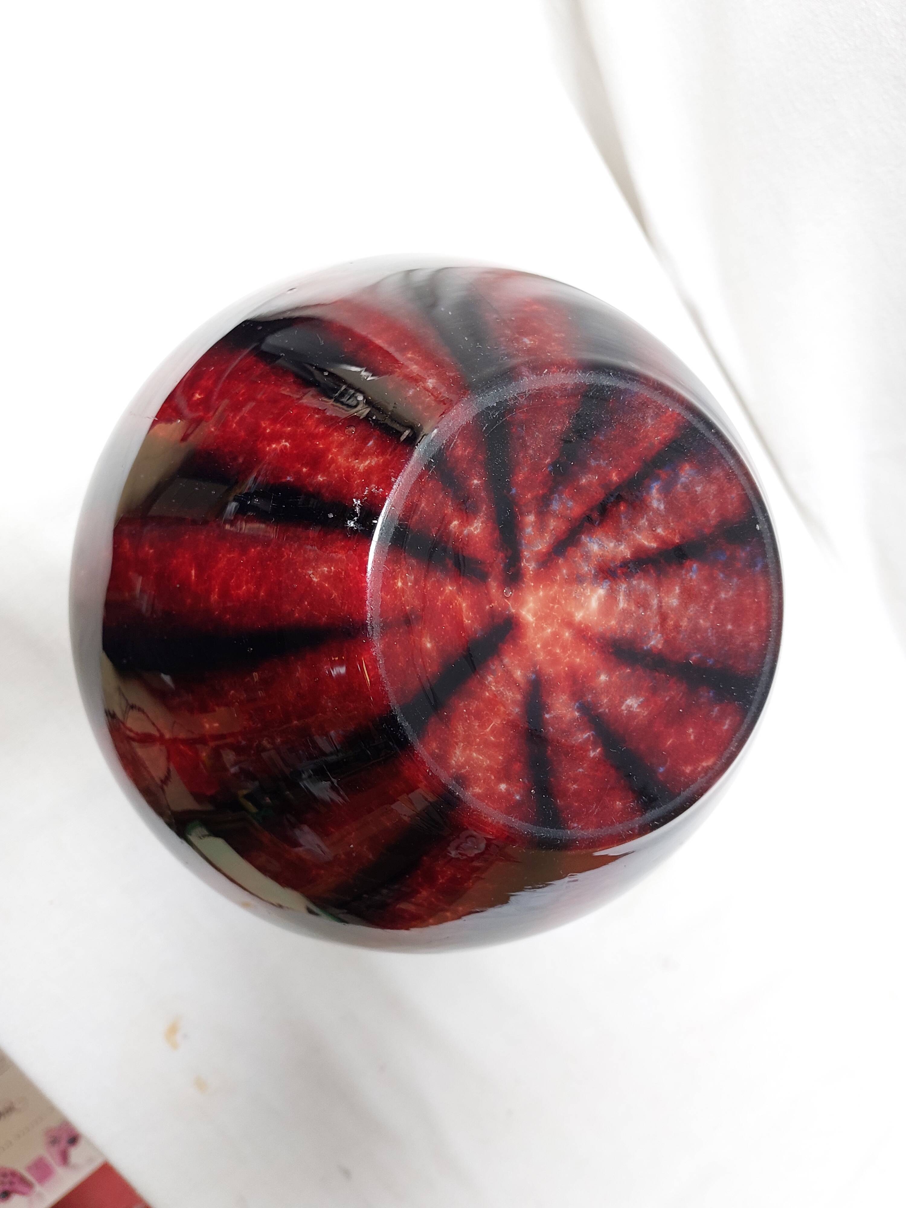 Large vintage blown glass ball vase with red and midnight blue flamed decor