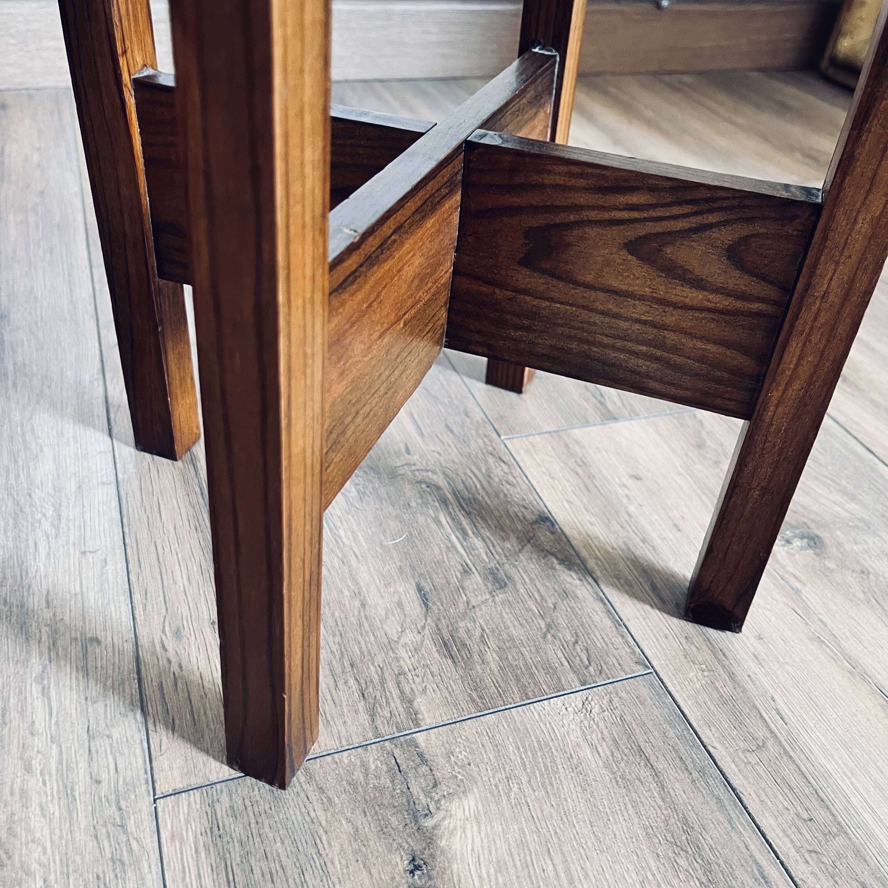 Wooden pedestal table