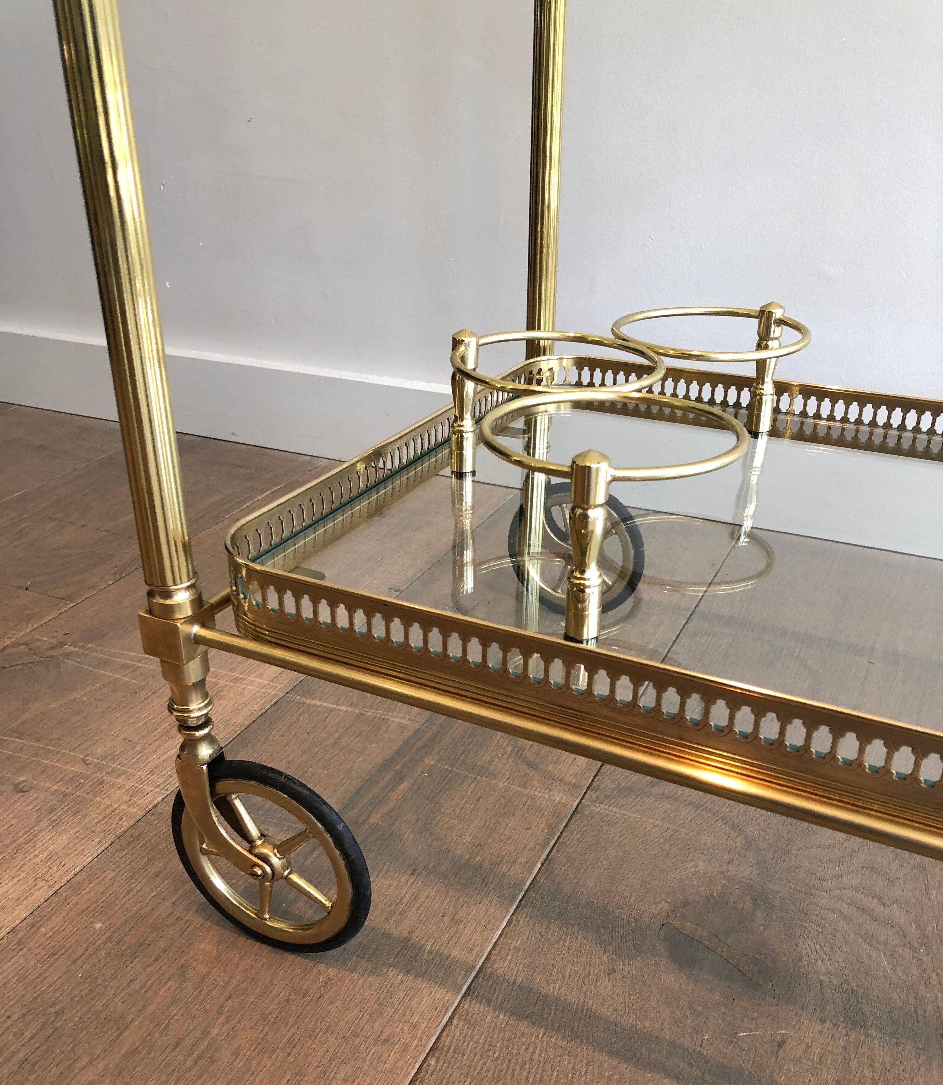 Brass rolling table with removable double trays from Maison Jansen.