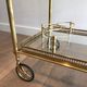 Brass rolling table with removable double trays from Maison Jansen.