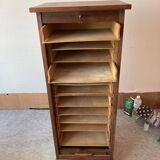 Small curtain filing cabinet.